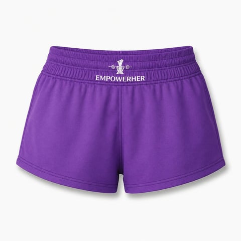 Purple athletic shorts with elastic waistband and EMPOWERHER logo, laid flat on white background