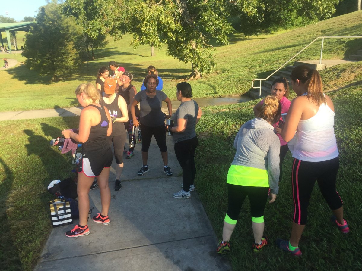 Outdoor fitness group participating in an exercise class